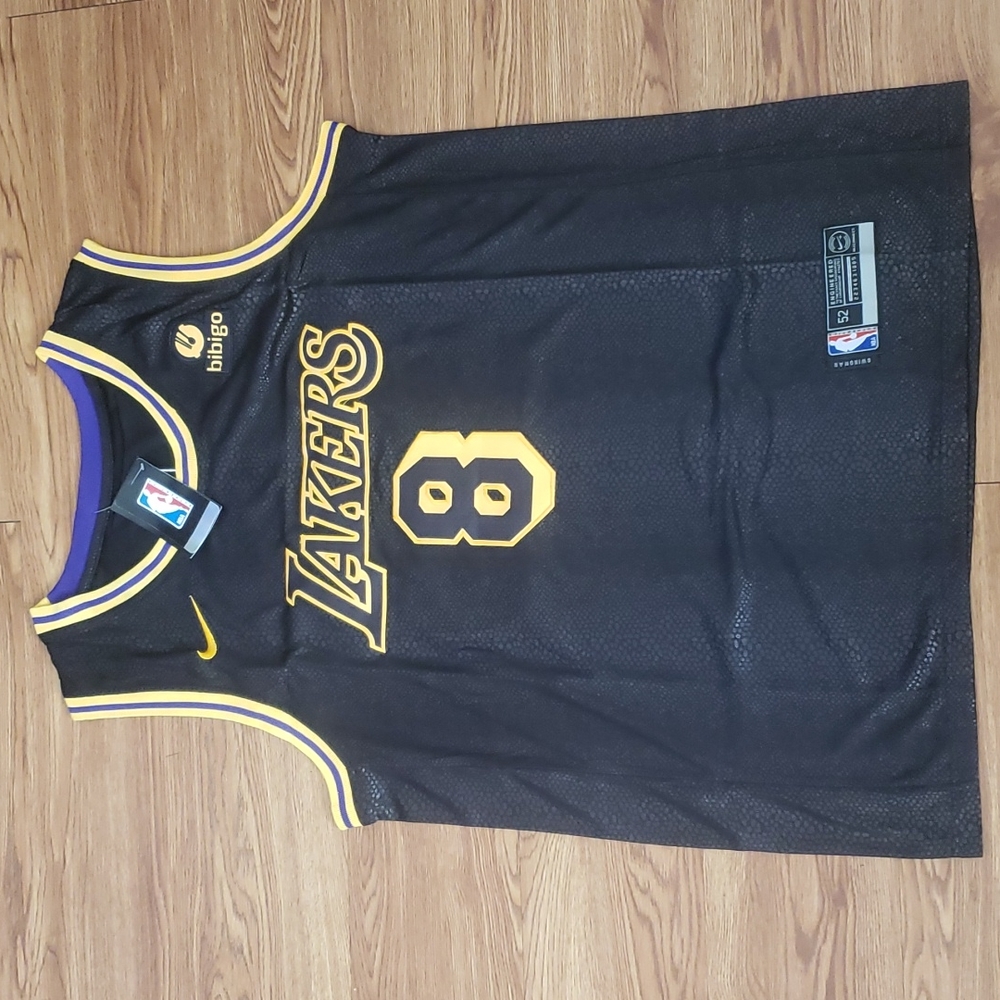 KOBE BRYANT 8 AND 24 SWINGMAN JERSEY.